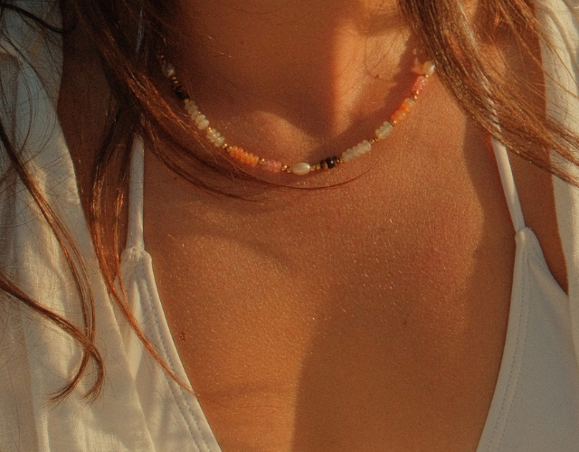 women wearing a beaded natural stone necklace tarnish free